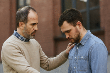 One Man Consoling Another
